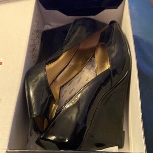 Black patent peep toe wedges